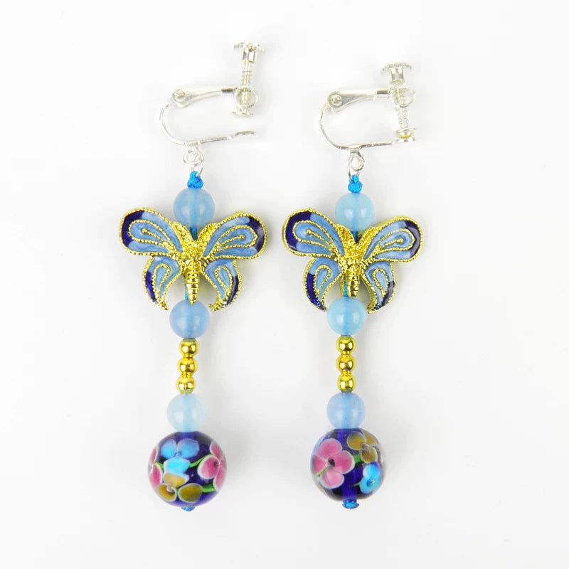 Pair of blue cloisonne-style butterfly earrings with U-clip fastenings