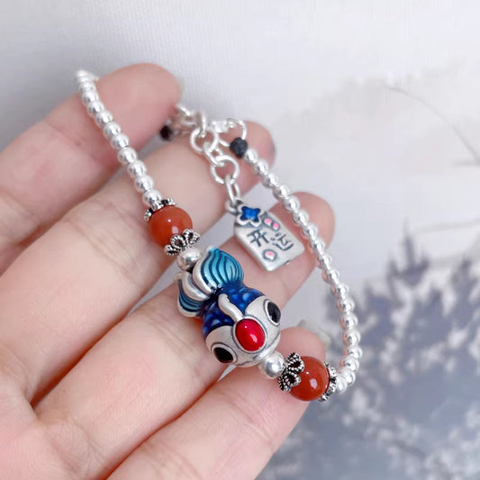 Who Should Wear an Enamel Goldfish Bracelet?