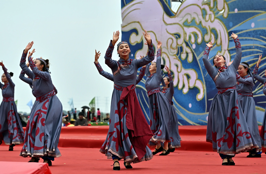 Daur dancers performing Lurigele at a contemporary cultural festival