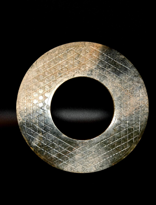 Circular jade bi with an intersecting mat-like grid pattern