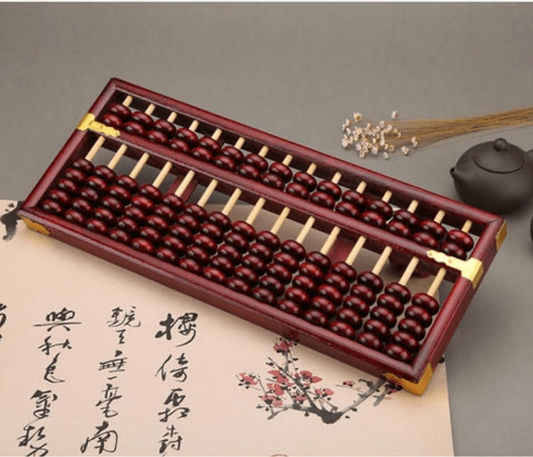 Traditional Chinese two-five abacus on a desk