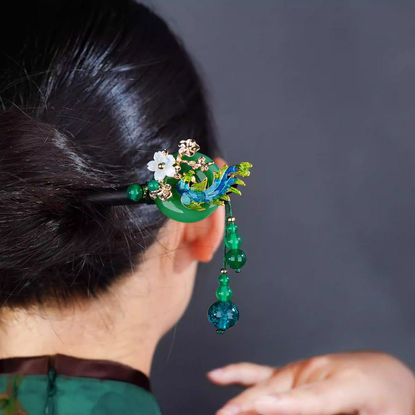 Elegant green and gold hairpin with cloisonné phoenix and stone plum blossom inlay