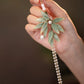 Elegant Chinese Bamboo Leaf Pin – Qipao Pressing Brooch with Tassel Design
