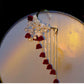 New Chinese Style Red Lily Earrings – Long Tassel Ear Clip for Hanfu and Qipao