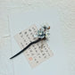 Elegant New Chinese aesthetic hair accessory crafted with mulberry silk and natural sandalwood for timeless cultural beauty