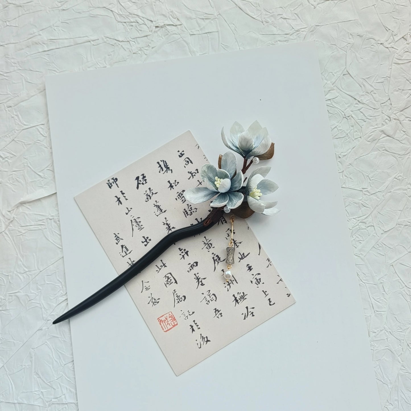 Elegant New Chinese aesthetic hair accessory crafted with mulberry silk and natural sandalwood for timeless cultural beauty