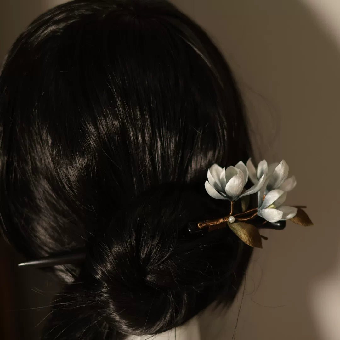 Elegant New Chinese aesthetic hair accessory crafted with mulberry silk and natural sandalwood for timeless cultural beauty