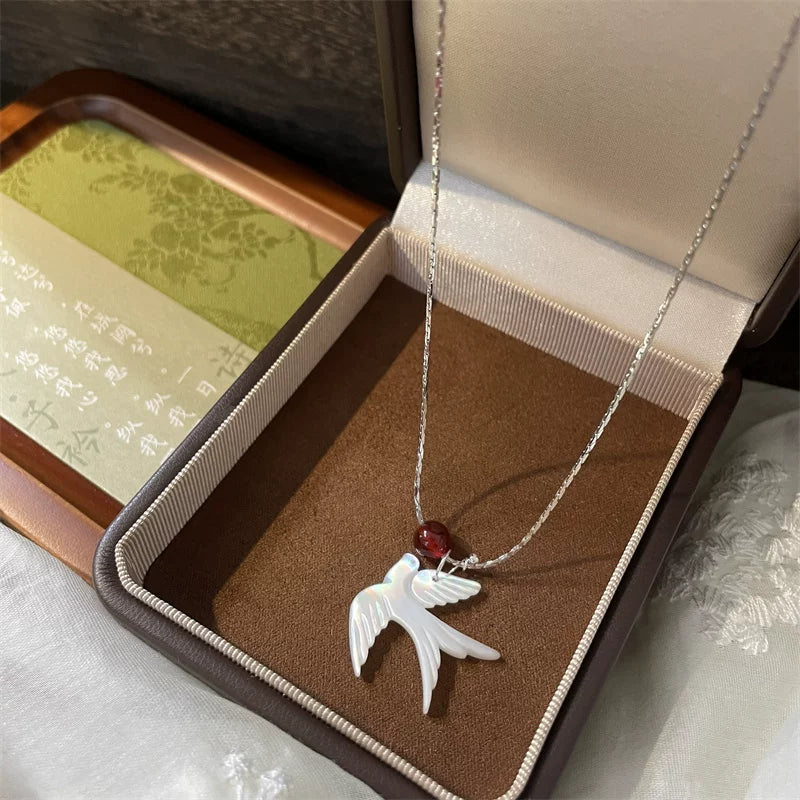 Chinese Feng Bird Necklace – White Shell & Red Agate Minimalist Pendant