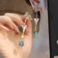 Mother-of-Pearl Butterfly & Blue Gourd Tassel Earrings – Elegant Handcrafted Statement Earrings for Women