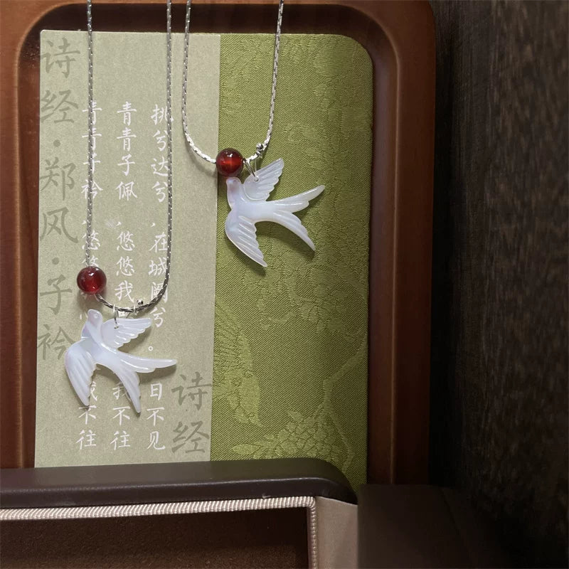 Chinese Feng Bird Necklace – White Shell & Red Agate Minimalist Pendant