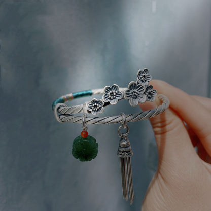 Nationaler Retro-Stil gewebtes Armband mit Pflaumenblüten und personalisierter Quaste