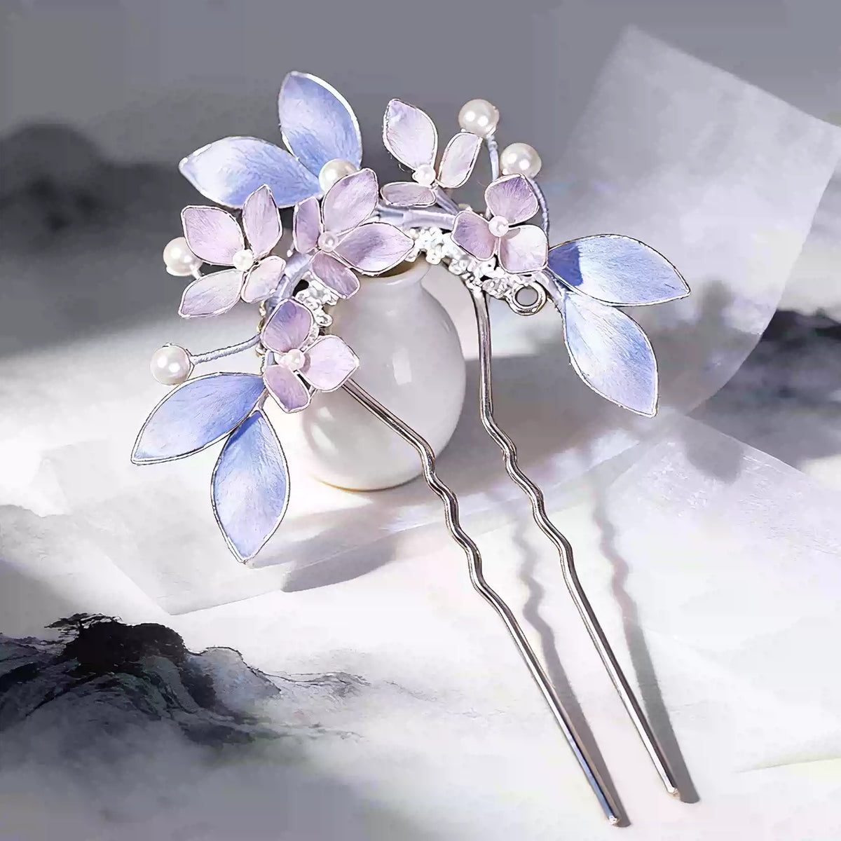 Pair of purple and blue floral hairpins with bead accents and long metal stems