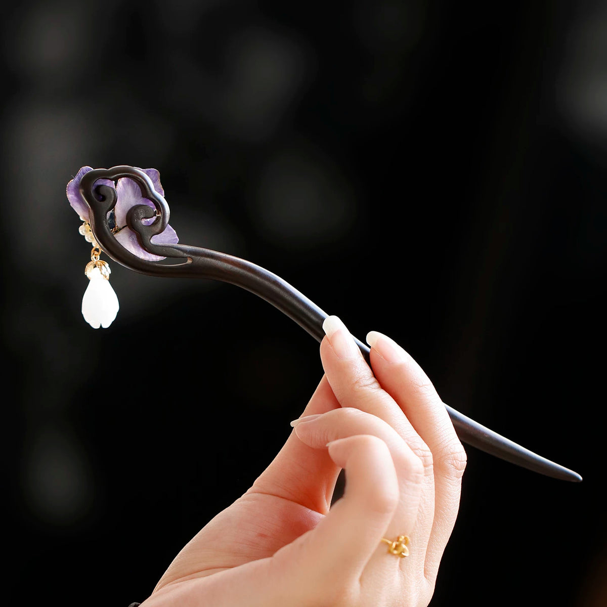 Back view of the wooden hairpin and flower ornament
