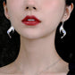 Fishtail fishbone China-Chic silver earrings