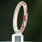 Koi motif bangle displayed upright, showing the inner band and lacquer finish