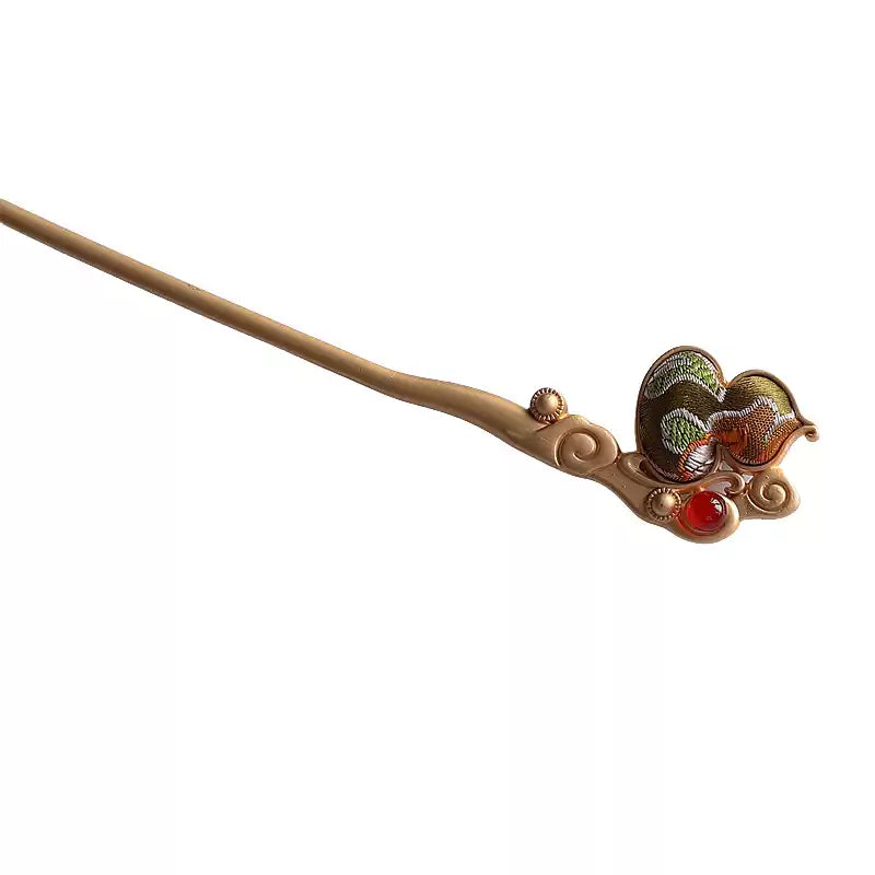 Light green fabric gourd hairpin on a white background