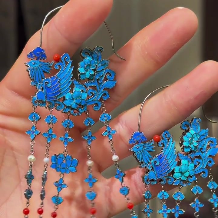 Phoenix drop earrings with hook closures and long chain tassels