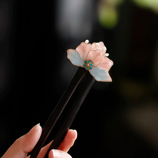 Handmade pink and blue velvet flower wooden hairpin close-up
