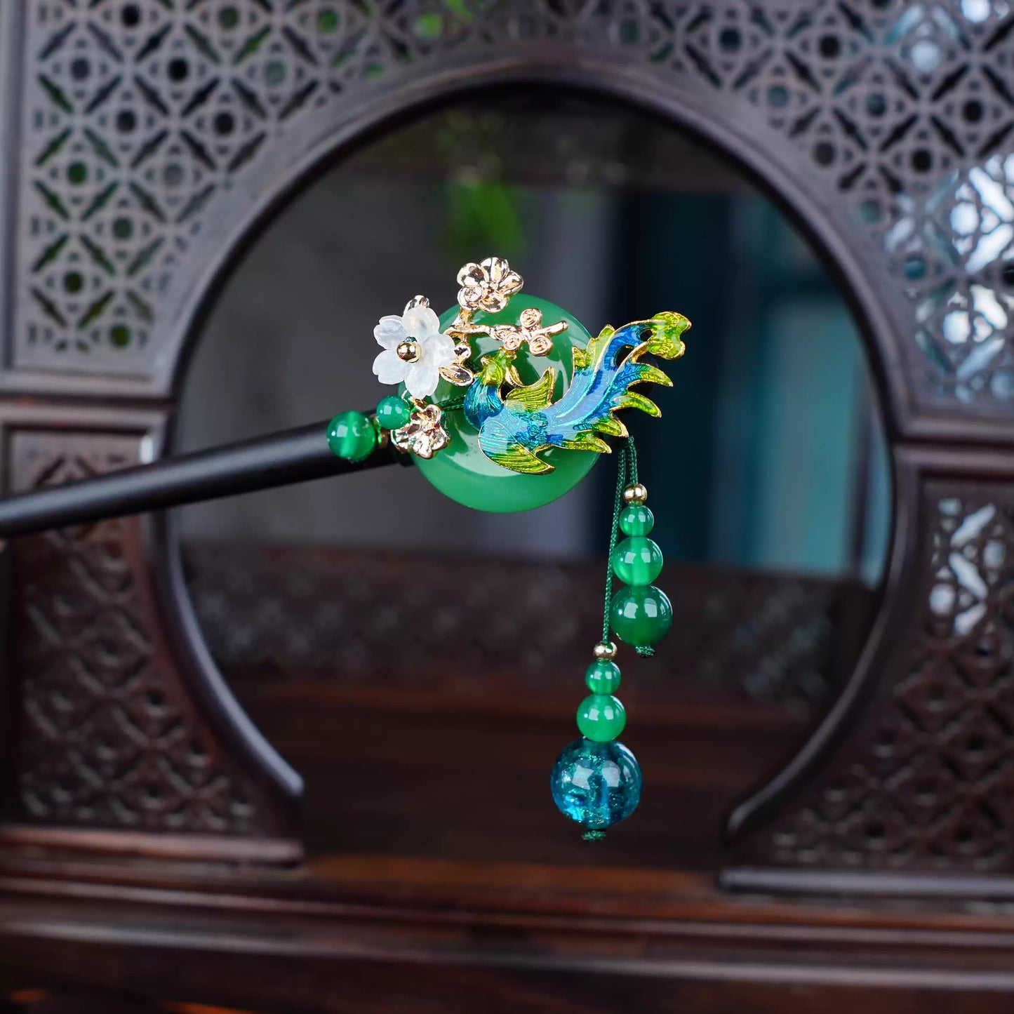Elegant green and gold hairpin with cloisonné phoenix and stone plum blossom inlay