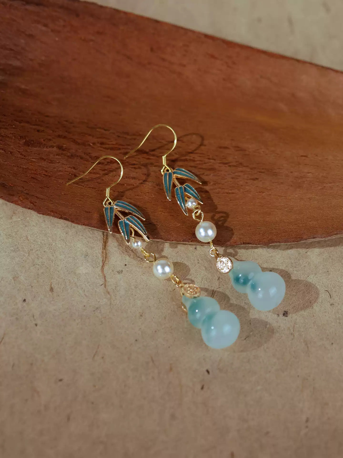 Gold-plated silver hooks, blue bamboo leaves, imitation pearls and quartz gourds