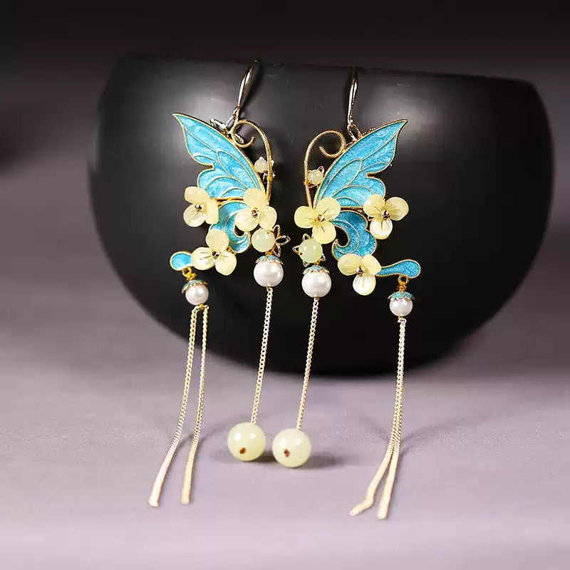 Pair of blue butterfly and flower tassel earrings