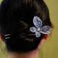 Blue butterfly metal-mesh ornament on a U-shaped hairpin