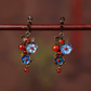 Screw clip-on version of blue cloisonne flower and red agate earrings