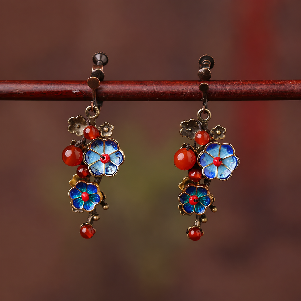 Screw clip-on version of blue cloisonne flower and red agate earrings
