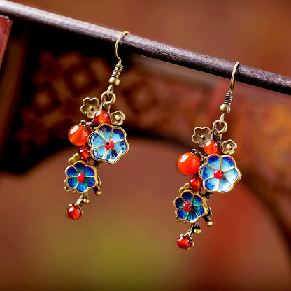 Standard hook earrings with blue enamel flowers and red agate beads