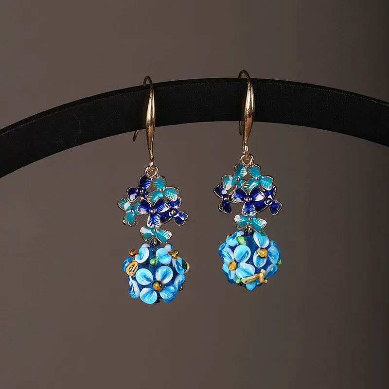 Blue and turquoise floral drop earrings with gold-tone copper hooks
