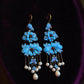 Pair view of the blue peony butterfly earrings with long dangling bead accents