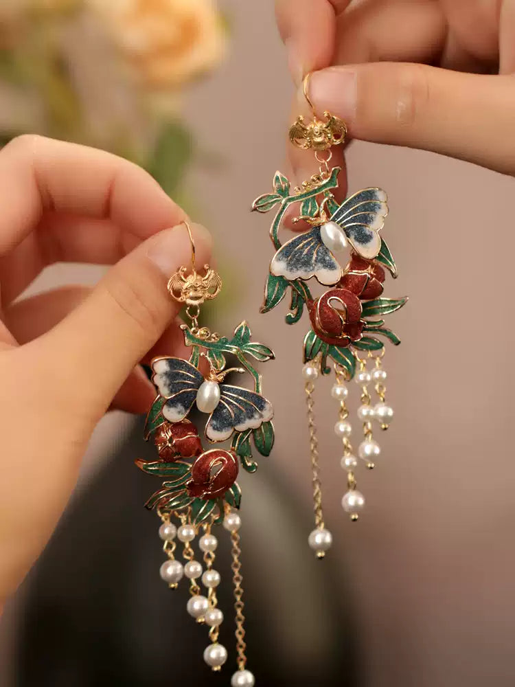 Close view of colorful butterfly and bead tassel details