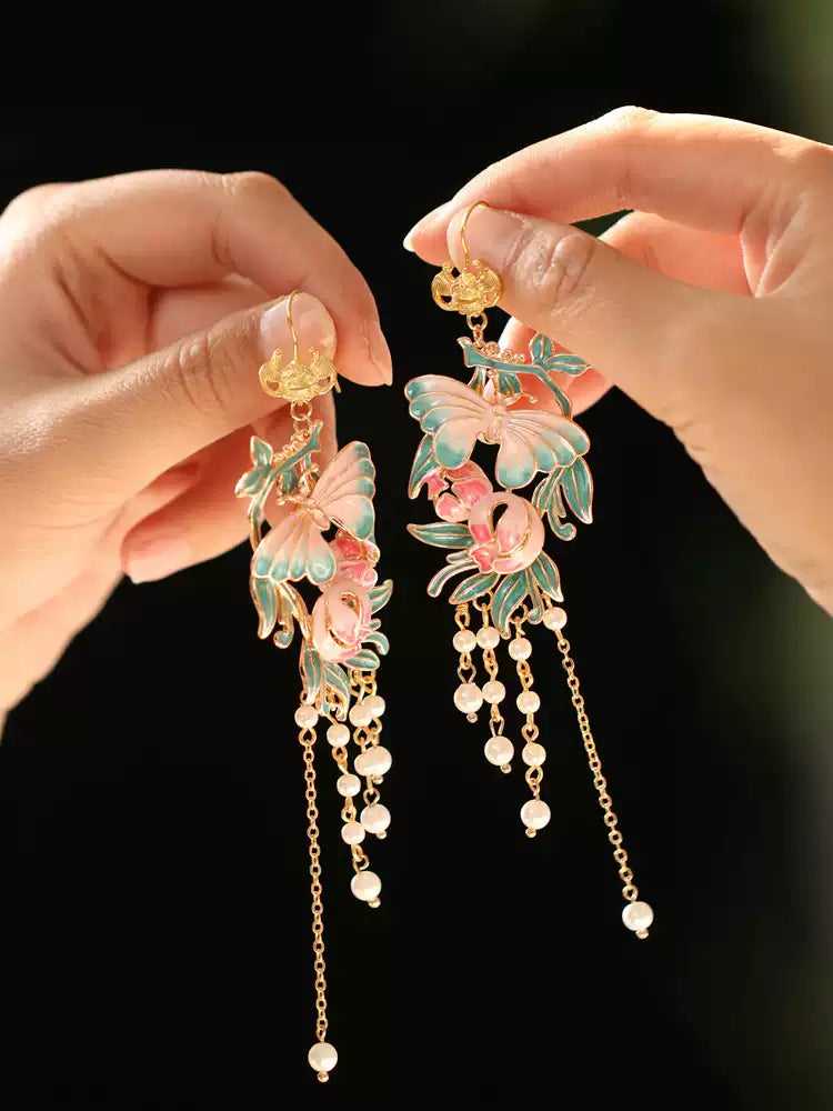 Pair of vintage courtly butterfly drop earrings