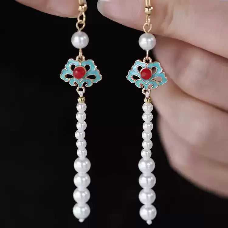 Pair of Chinese-inspired cloud motif earrings with white bead tassels