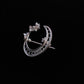 Reverse view showing the pin clasp on the crescent moon brooch