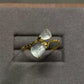Overhead view of the adjustable open band and paired lotus pod details