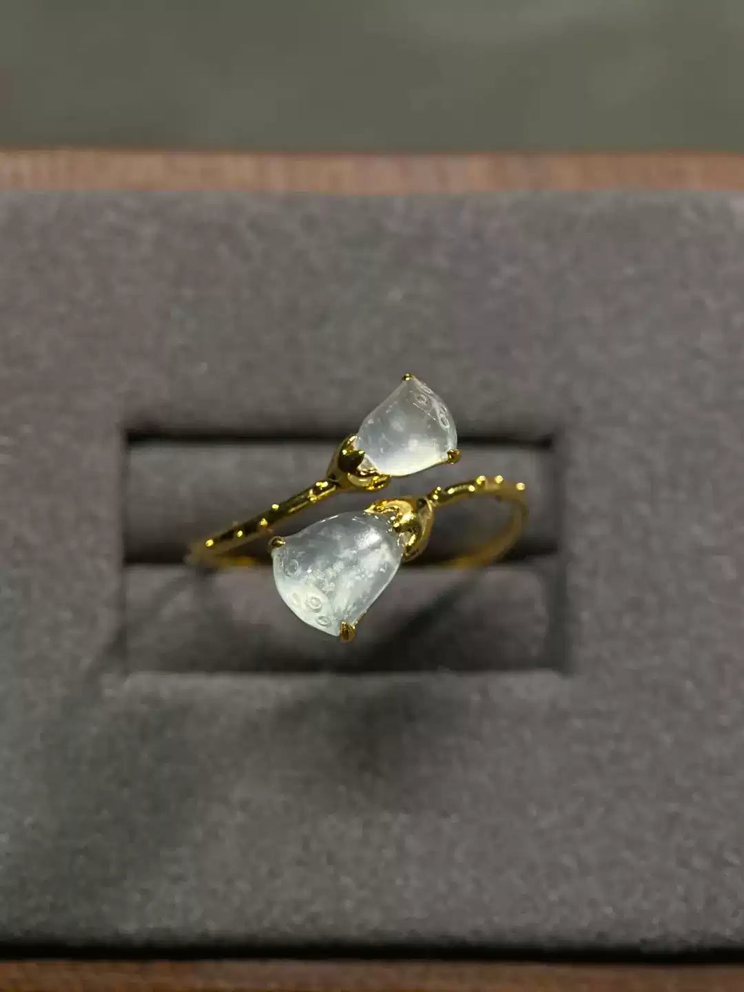 Overhead view of the adjustable open band and paired lotus pod details
