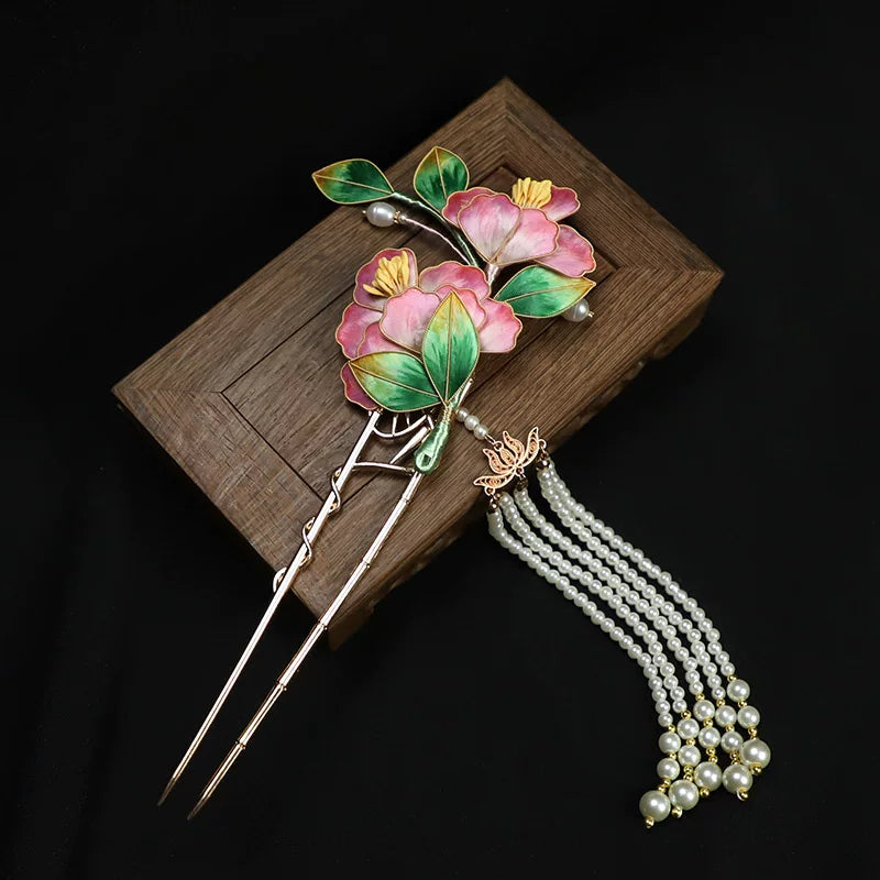 Pink floral U-shaped hairpin with a white beaded tassel