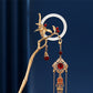 Gold bamboo orchid hairpin top detail with red beads
