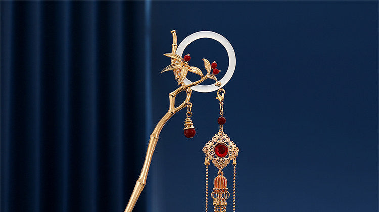 Gold bamboo orchid hairpin top detail with red beads