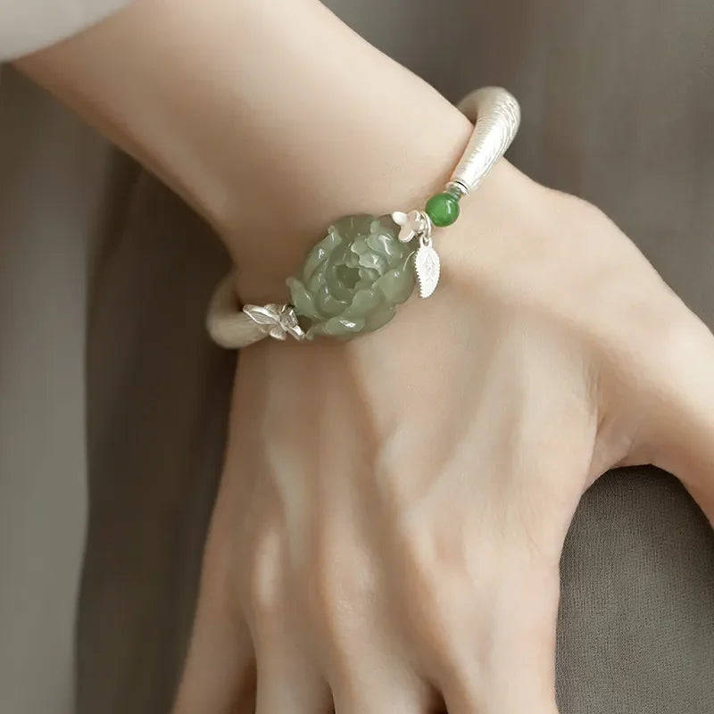 Green faux jade-style peony and butterfly copper cuff bracelet, front view