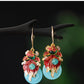 Pair of koi fish earrings displayed together