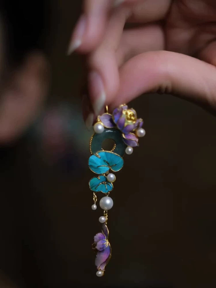 Long blue and purple lotus drop earrings with circular motifs