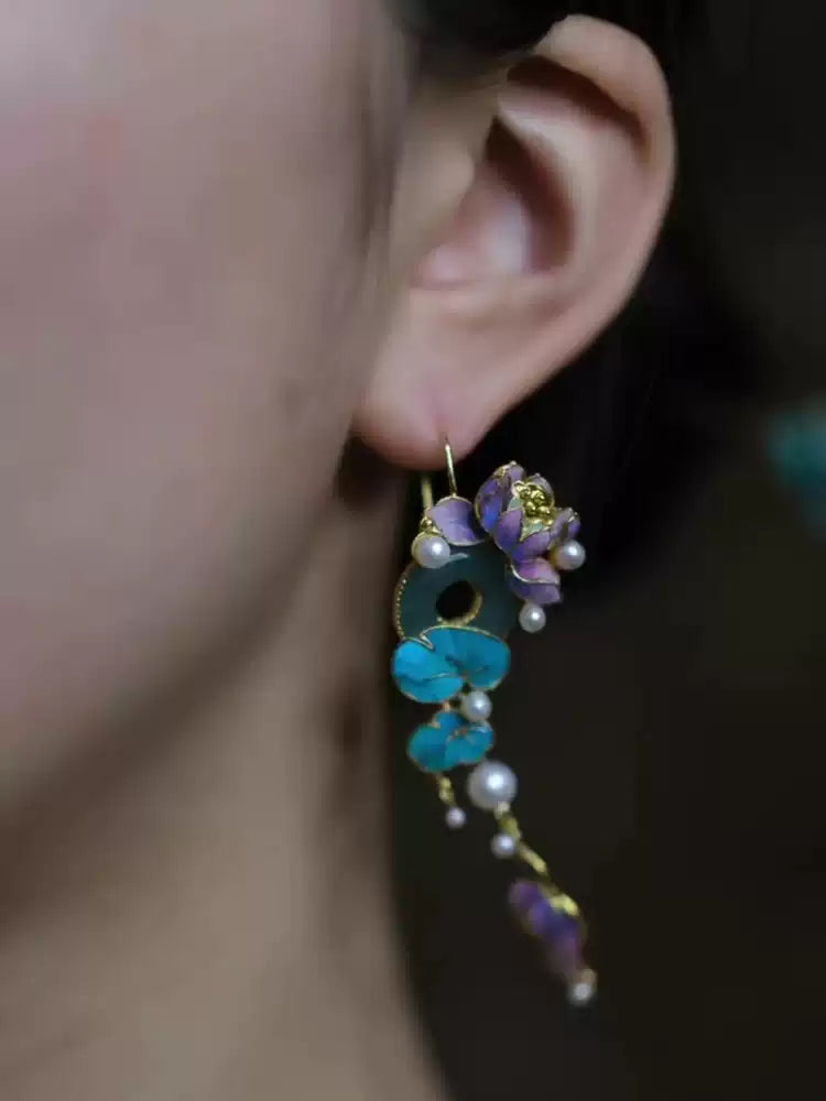 Side view of the dangling lotus earrings