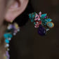 Close-up of the lotus and leaf earring design