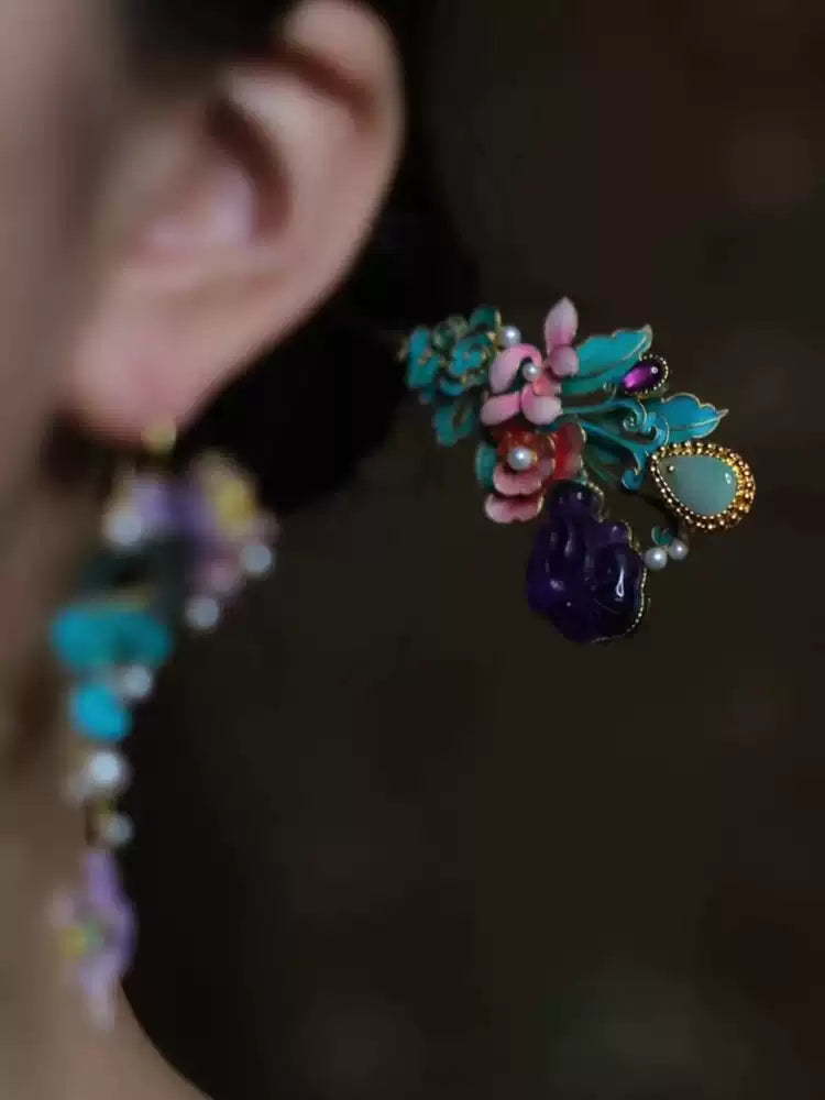 Close-up of the lotus and leaf earring design