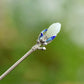 Silver-tone magnolia hairpin with blue floral details