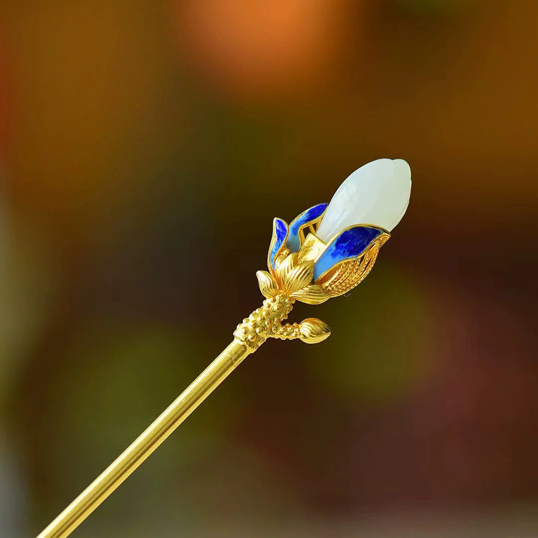 Gold-tone magnolia hairpin with the standard gift box