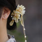Magnolia tassel side hair clip in Mist Jade Yellow worn in hair