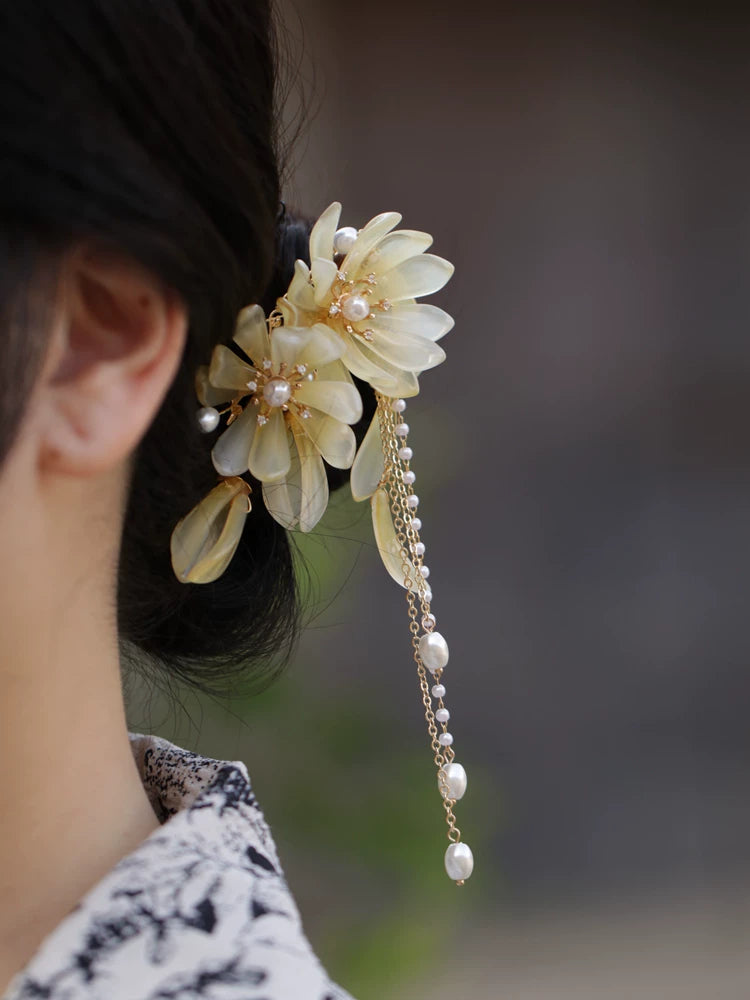 Magnolia tassel side hair clip in Mist Jade Yellow worn in hair